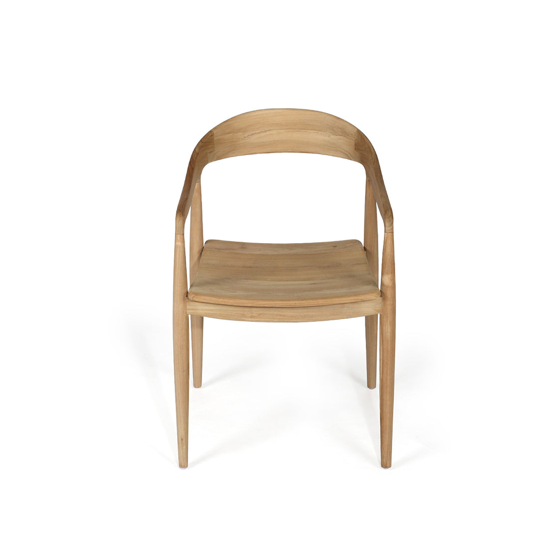 Angled view of Rigby Armchair – Natural highlighting sculpted arms and tapered legs.