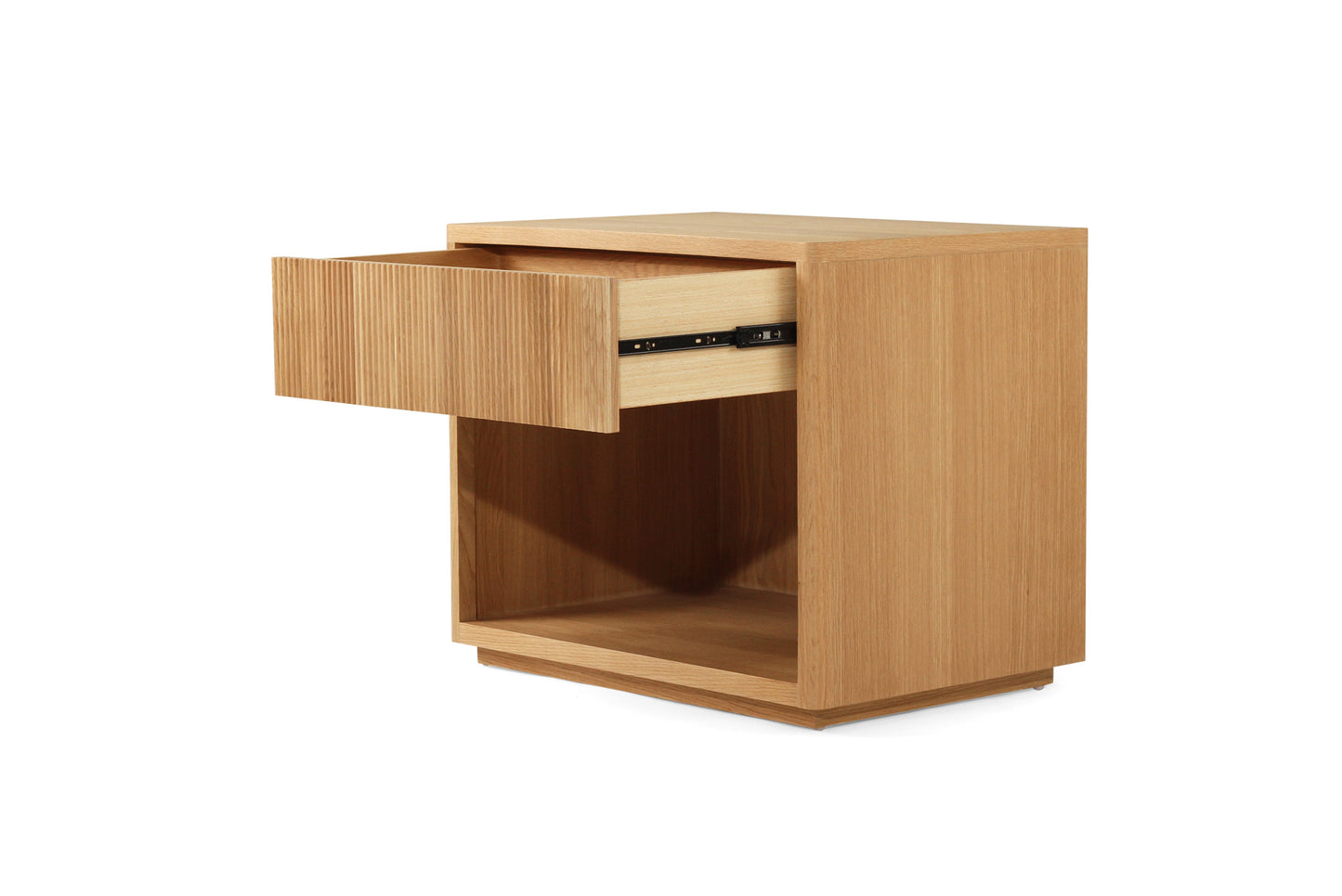 Angled open drawer view of Harlow Bedside Table – Natural highlighting fluted detailing and storage space