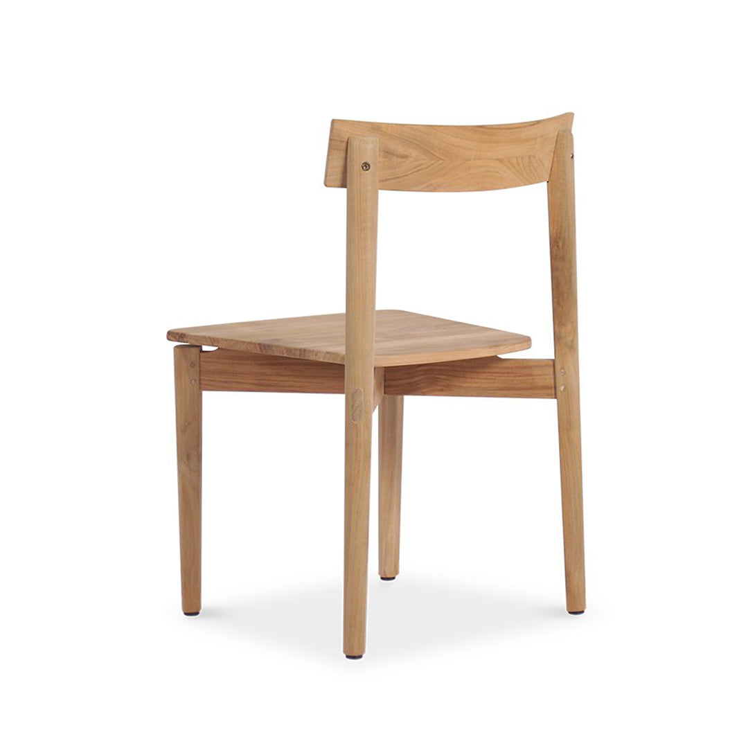 Rear angle of Jude Dining Chair – Natural showing oak backrest curve and structural frame