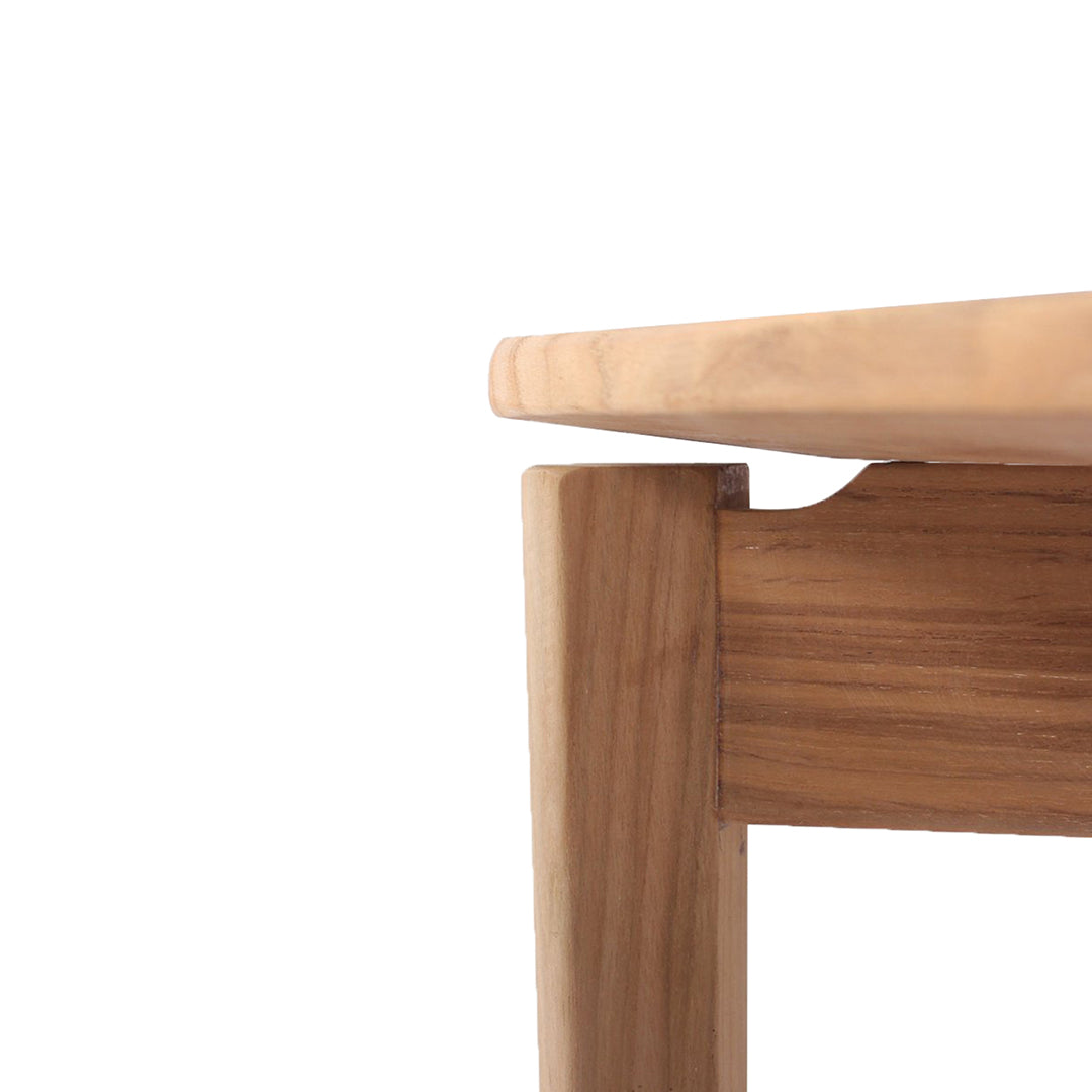 Close-up detail of Jude Dining Chair – Natural showing timber seat edge and frame joinery