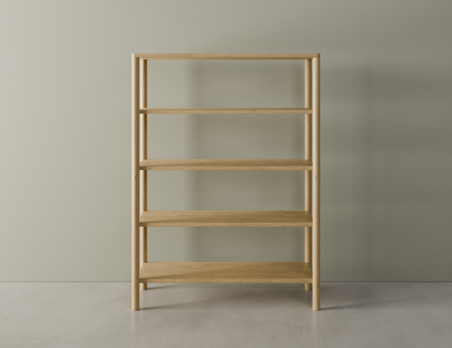 Front view of a wooden bookshelf in a natural American oak finish with 4 shelves on a polished concrete floor.