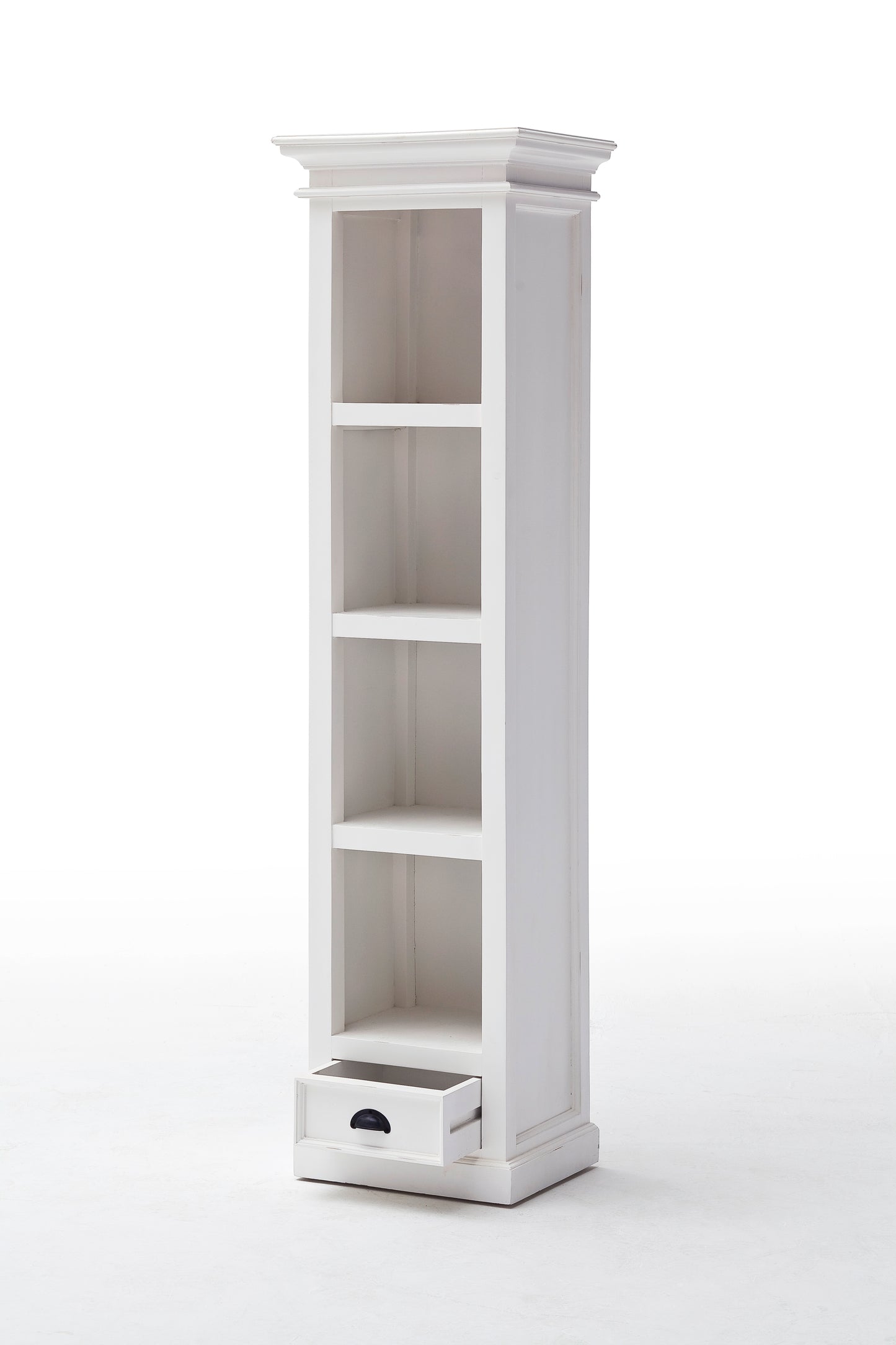 Slightly angled front view of a white wooden bookshelf with 4 shelves and 1 drawer, which is open, with antique brass hardware.