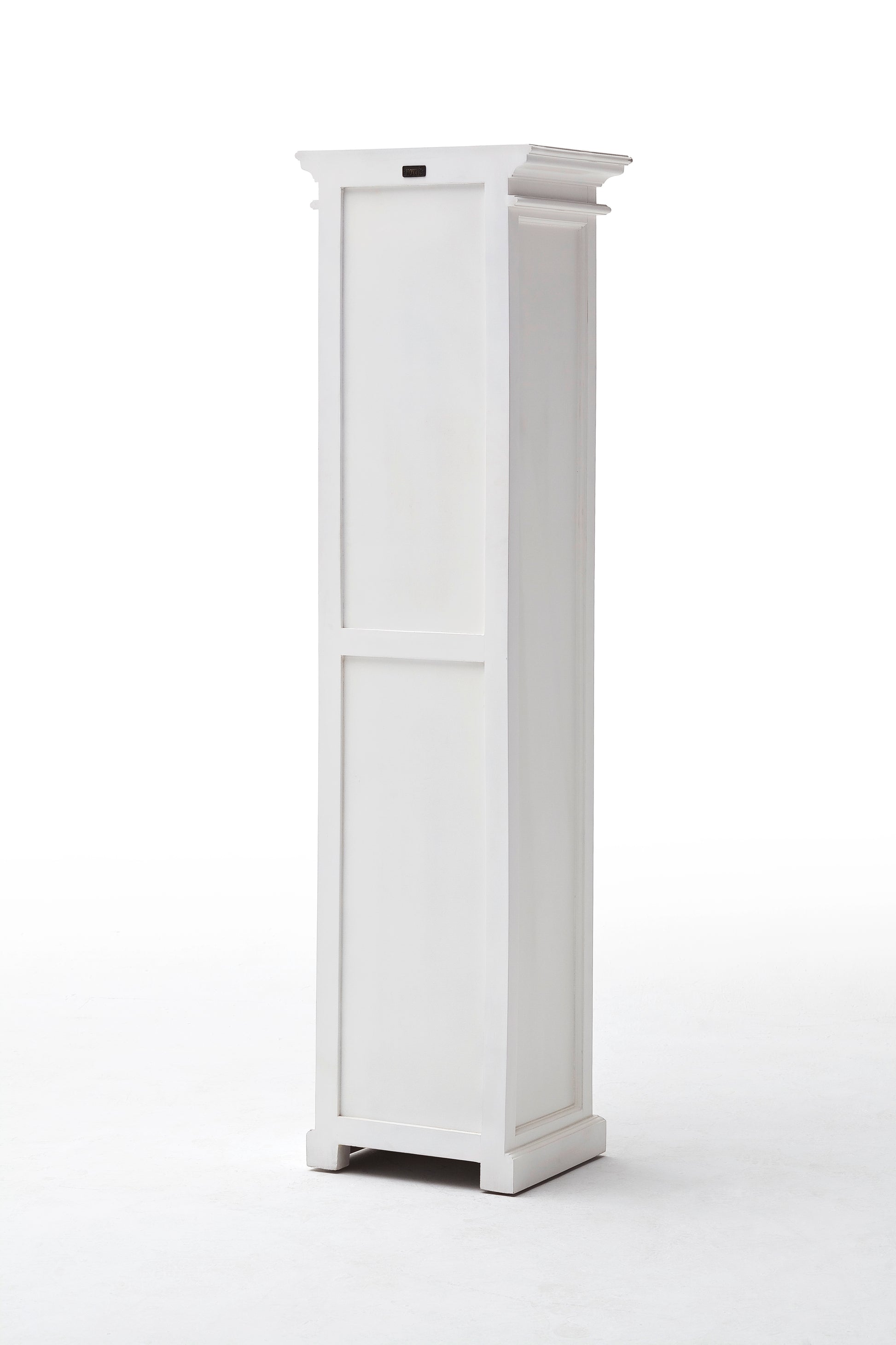 Slightly angled rear view of a white wooden bookshelf with 4 shelves and 1 drawer with antique brass hardware.