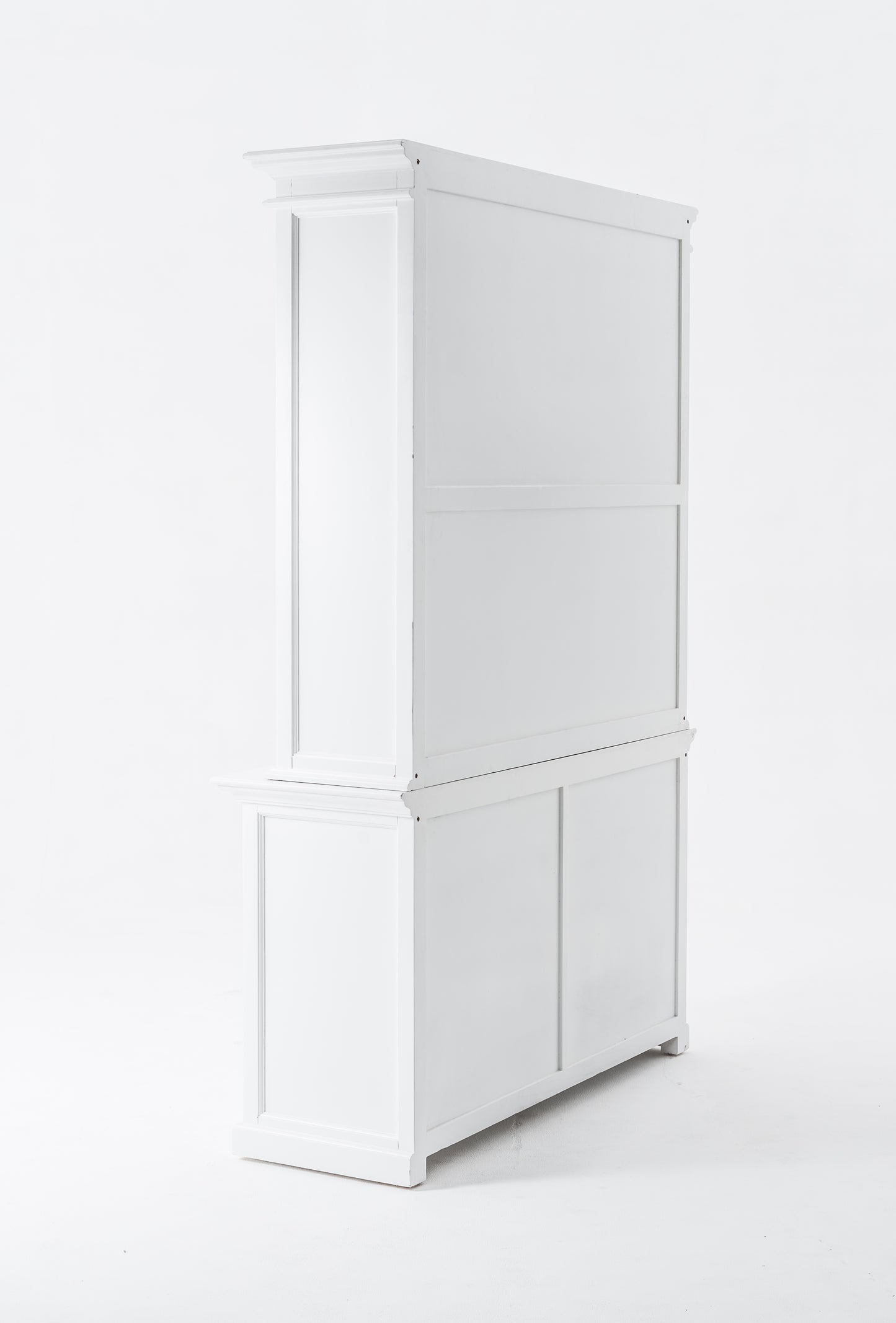 Slightly angled rear view of white wooden buffet hutch unit with 2 adjustable shelves, 4 doors and 2 drawers with antique brass hardware.