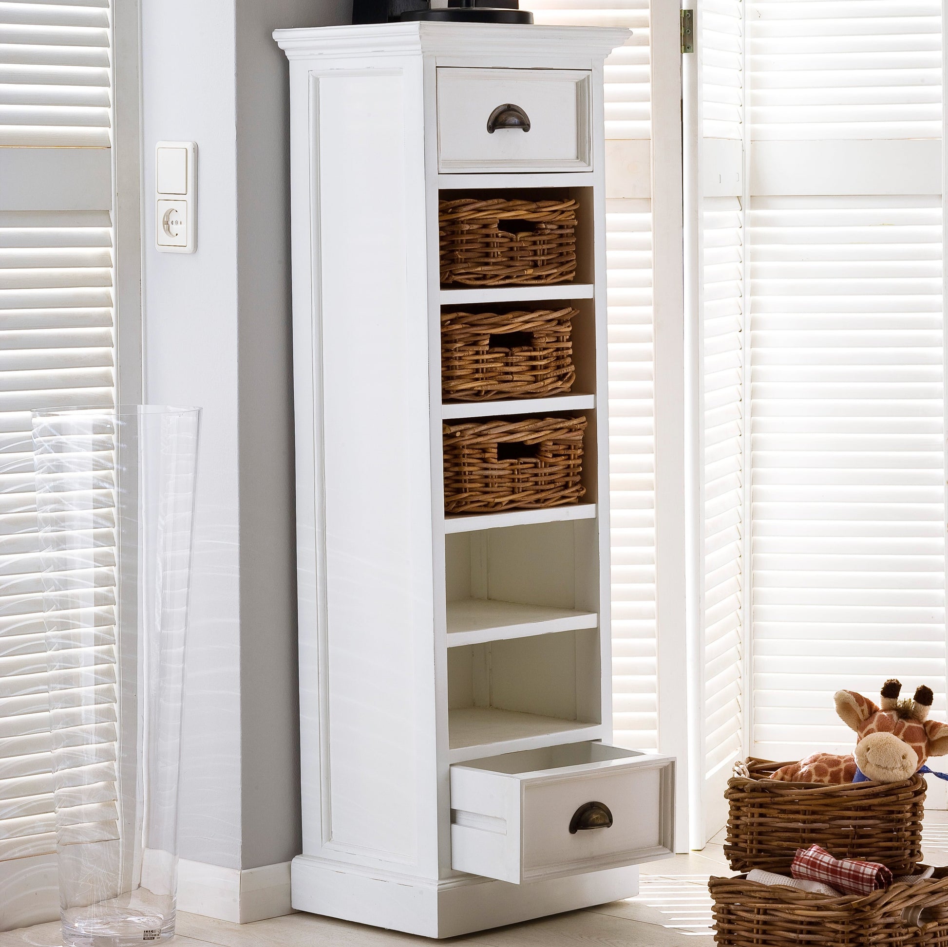 NovaSolo Halifax white wooden storage tower with 5 shelves, 3 rattan baskets and 2 drawers with antique brass hardware.