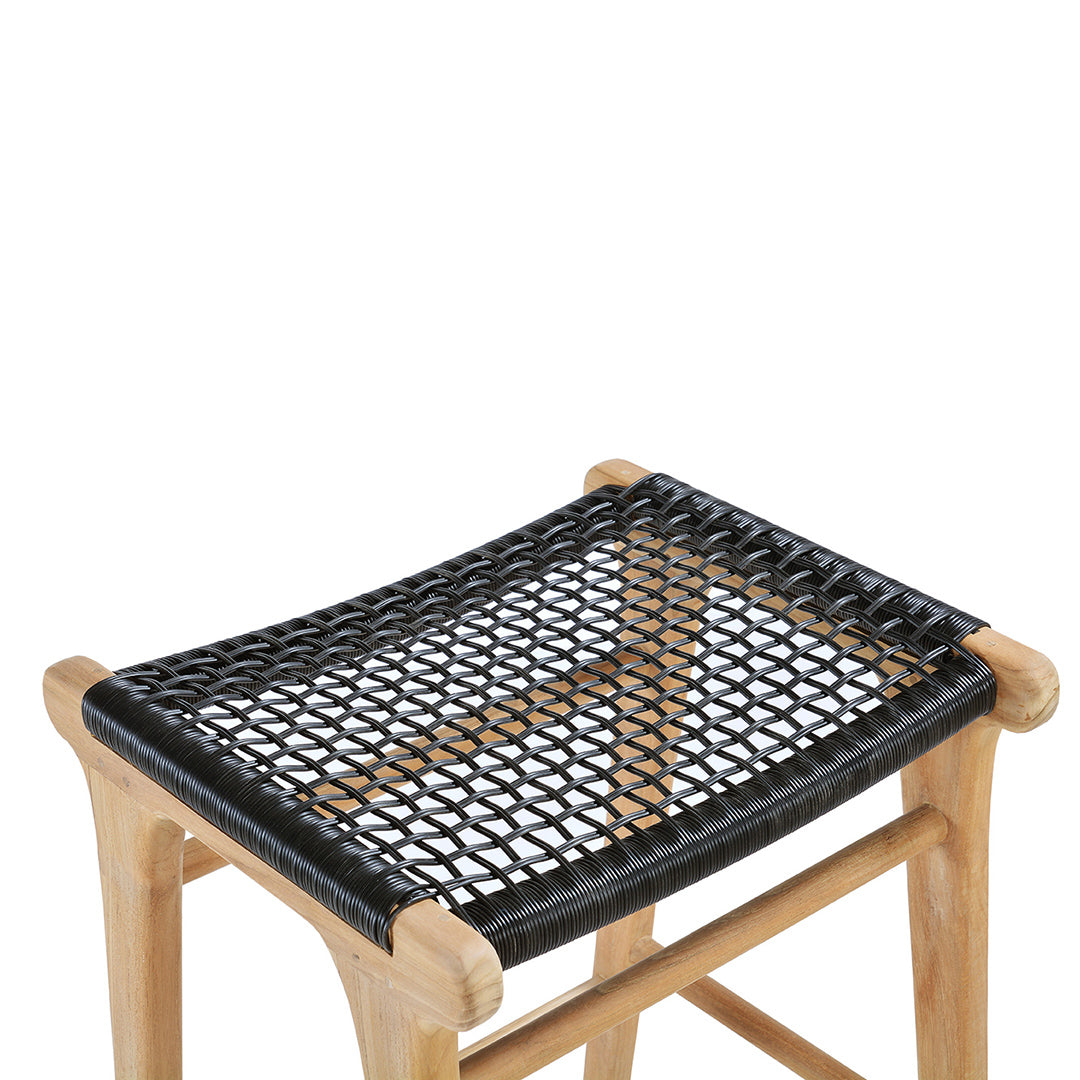 Angled close-up of the Zen Backless Bar Stool – Black – Open Weave showing the intricate handwoven synthetic seat detail.