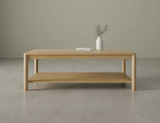 Rectangular wooden coffee table in natural oak finish with decorative white vase.