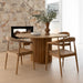 Lifestyle dining view of Rigby Armchair – Natural styled with round oak table.