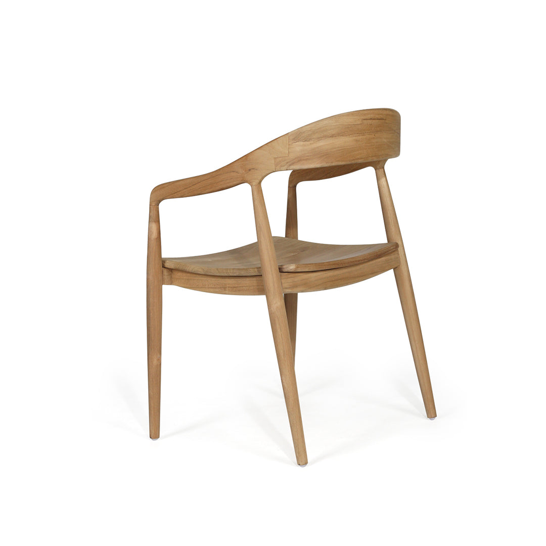 Three-quarter rear view of Rigby Armchair – Natural highlighting craftsmanship and frame.