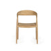 Back view of Rigby Armchair – Natural with continuous oak grain and rounded backrest.