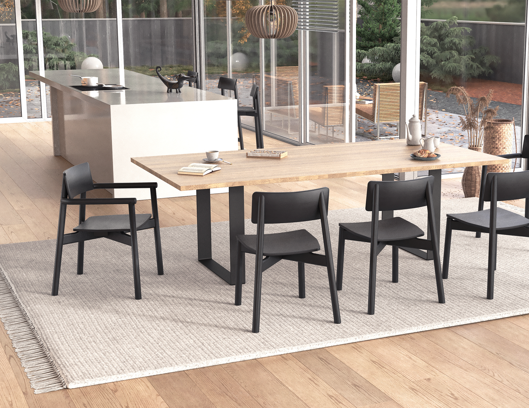 Lifestyle dining room scene with Andi Armchair Black chairs סביב a rectangular wood dining table, showcasing modern interior with large glass windows, outdoor patio view, pendant lighting, and contemporary Scandinavian styling.