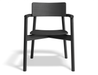 Front view of Andi Armchair Black wooden dining chair, emphasising ergonomic curved backrest, integrated armrests, solid timber construction, and sleek matte black finish isolated on a neutral background.