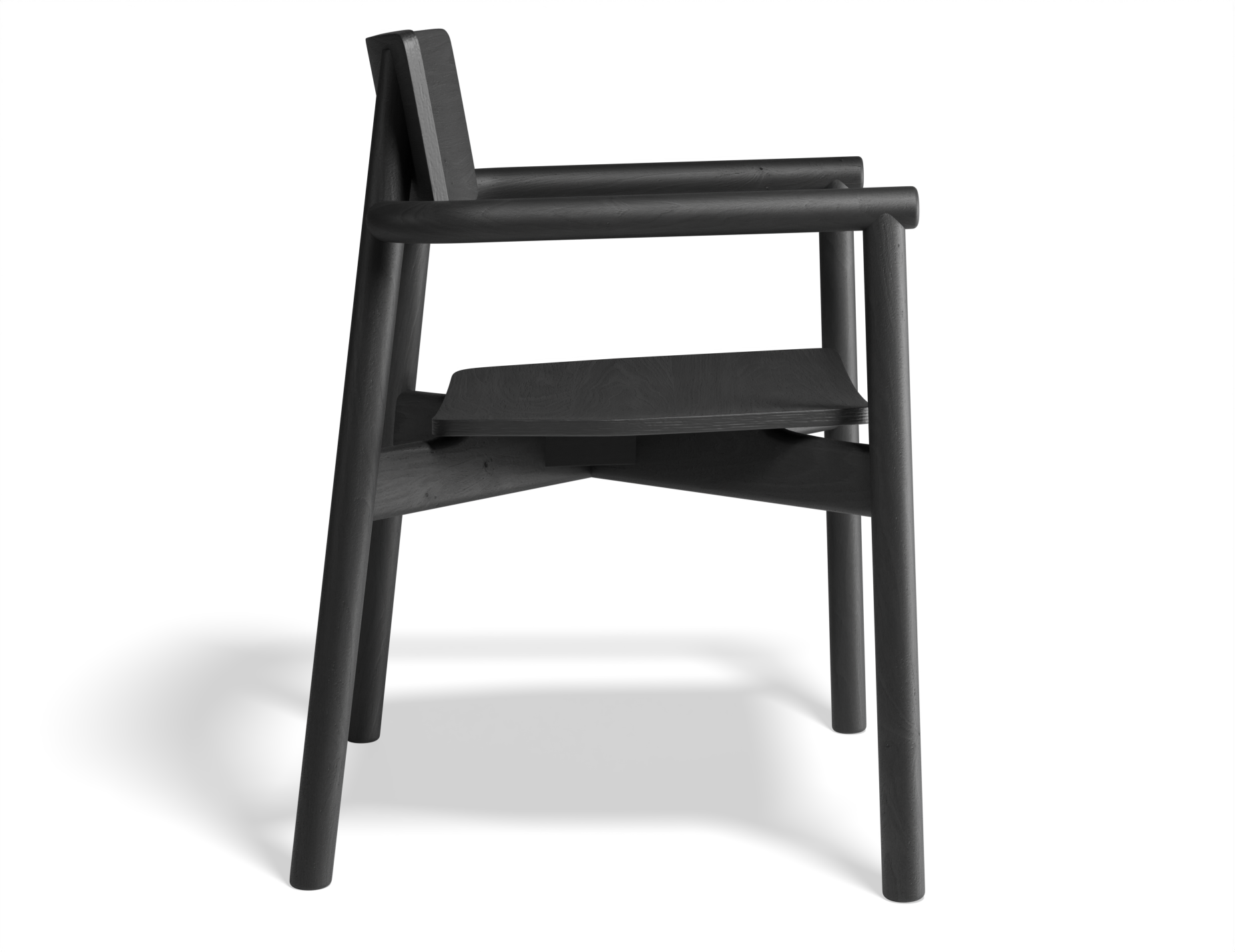 Side profile of Andi Armchair Black solid wood chair, highlighting smooth rounded armrests, angled back support, contoured seat, and minimalist Scandinavian design with a matte black finish on a neutral background.
