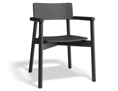 Three-quarter front view of Andi Armchair Black chair, showcasing sculpted seat, rounded armrests, sturdy frame, and modern Scandinavian aesthetic in a matte black wood finish on a clean background.