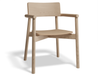 Three-quarter front view of Andi Armchair Natural solid oak dining chair, showcasing curved armrests, contoured seat, sturdy frame, and light wood grain finish isolated on a white background.