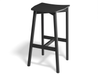 Angled perspective of Andi Backless Bar Stool - Black - 75 cm Seat Height, showcasing smooth curved seat edges, tapered solid wood legs, and durable modern construction.