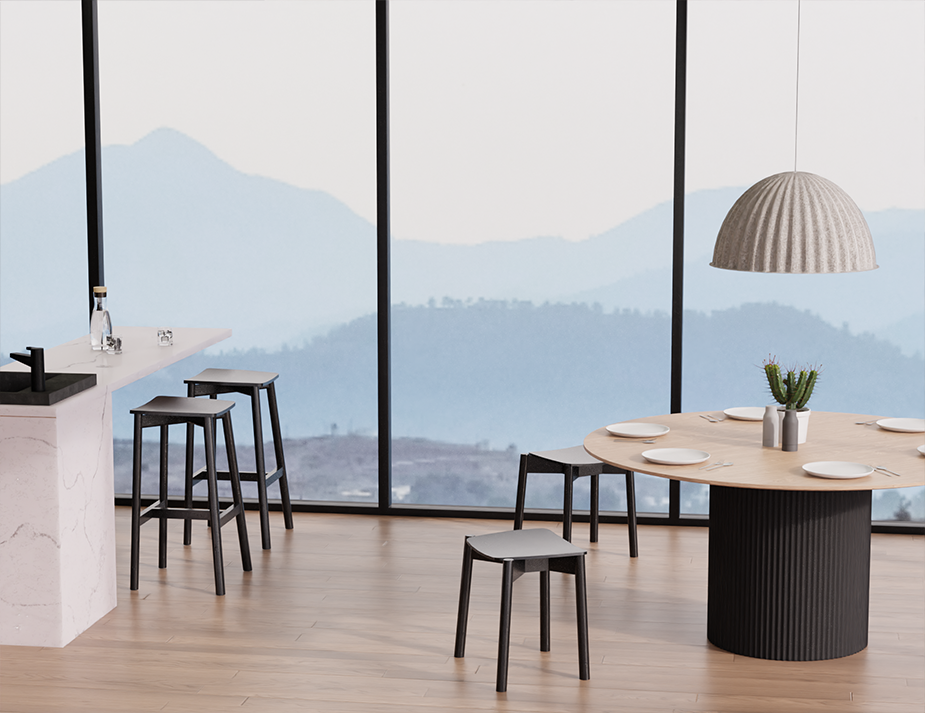 Andi Backless Bar Stool - Black - 75 cm Seat Height displayed in a bright dining area with large windows and mountain views, showcasing clean lines and modern interior styling.