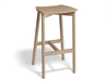 Angled front view of Andi Backless Bar Stool - Natural - 66 cm Seat Height, highlighting minimalist Scandinavian design, natural wood grain texture, and sturdy frame.