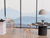 Andi Backless Bar Stool - Natural - 75 cm Seat Height styled in a contemporary dining space, paired with a modern table and large windows, highlighting versatile use and Scandinavian aesthetic.