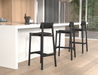 Bar counter setup with multiple Andi Bar Stool - Black - 75 cm Seat Height stools, highlighting uniform design, strong structure, and contemporary kitchen environment.