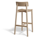 Rear angled view of Andi Bar Stool - Natural - 66 cm Seat Height, isolated, emphasising sculpted seat, angled legs, and smooth natural wood grain texture.