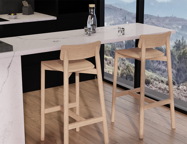 Two Andi Bar Stool - Natural - 66 cm Seat Height stools placed at a modern kitchen counter, showcasing clean lines, sturdy frame, and airy contemporary space.