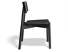 Profile view of Andi Dining Chair Black isolated, showing sculpted seat, angled legs, and ergonomic minimalist design.