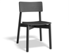 Three quarter front view of Andi Dining Chair Black isolated, emphasising smooth edges, natural wood grain texture, and modern minimalist form.
