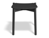 Front angled view of Andi Low Stool Black 45 cm seat height isolated on white background highlighting rounded corners and seamless wood construction