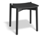 Side angled view of Andi Low Stool Black 45 cm seat height showcasing tapered legs smooth edges and minimalist craftsmanship