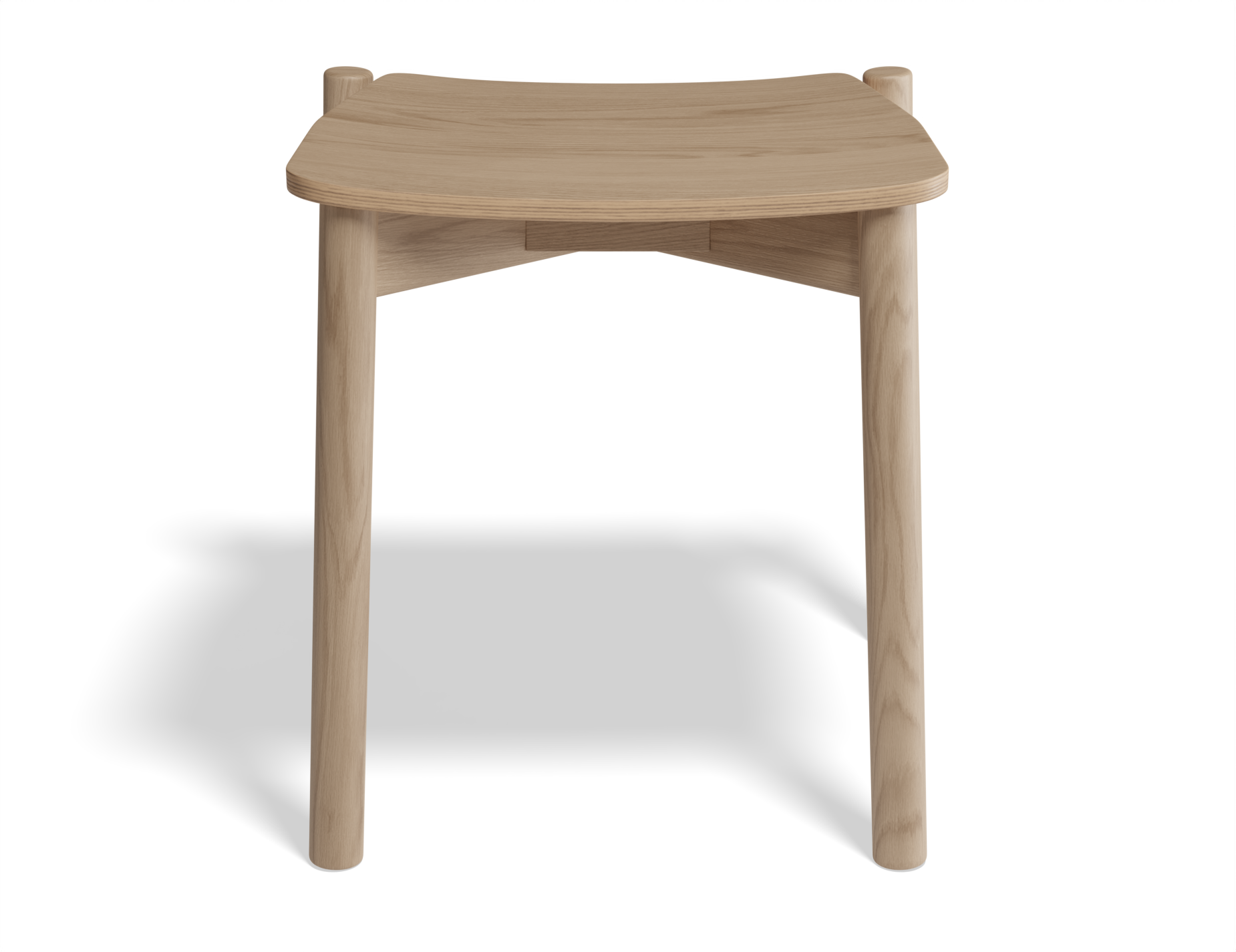 Front view of Andi Low Stool Natural 45 cm Seat Height solid oak stool with curved seat and rounded legs, minimalist Scandinavian design on white background.
