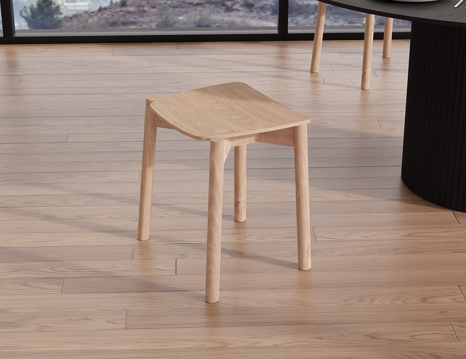 Front perspective view of Andi Low Stool Natural 45 cm Seat Height placed in modern interior with wooden flooring, highlighting compact size and organic form.