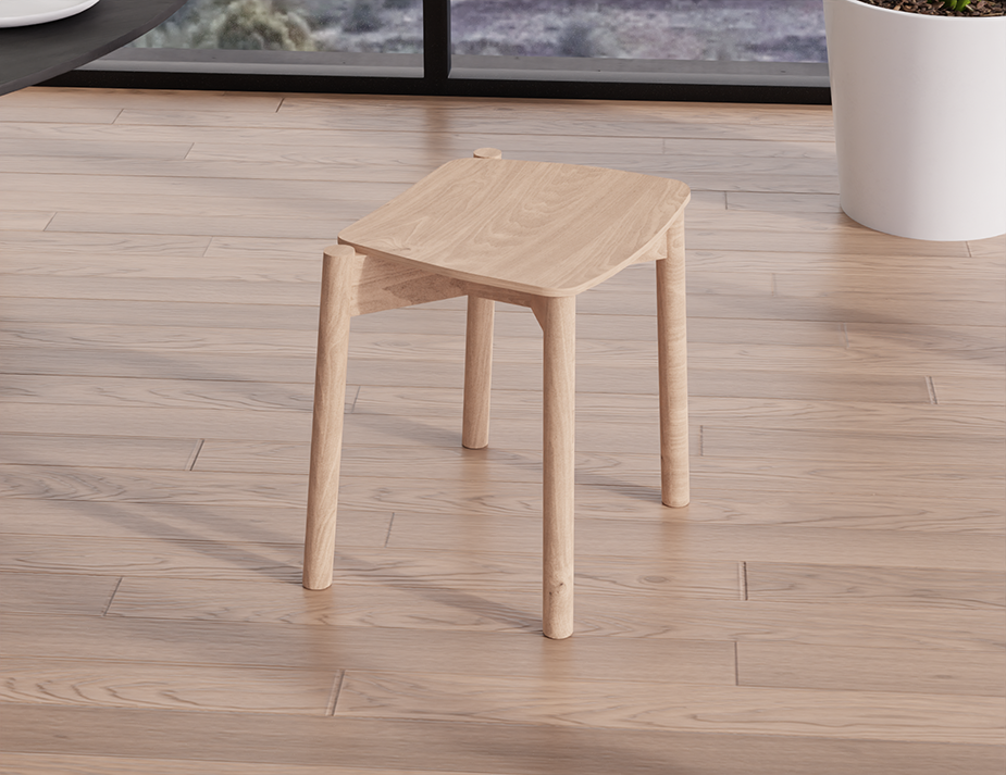 Rear angled view of Andi Low Stool Natural 45 cm Seat Height showing curved seat edges and sturdy round legs in contemporary living space.