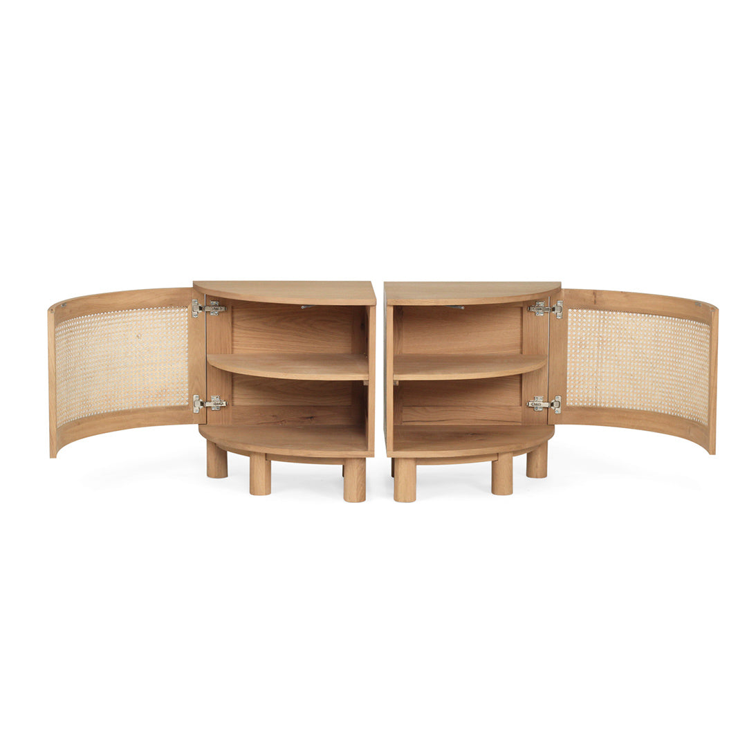 Both Iluka Bedside Tables – Natural (Pair) with doors open revealing curved oak shelves and cane‑lined doors