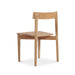 Rear angle of Jude Dining Chair – Natural showing oak backrest curve and structural frame