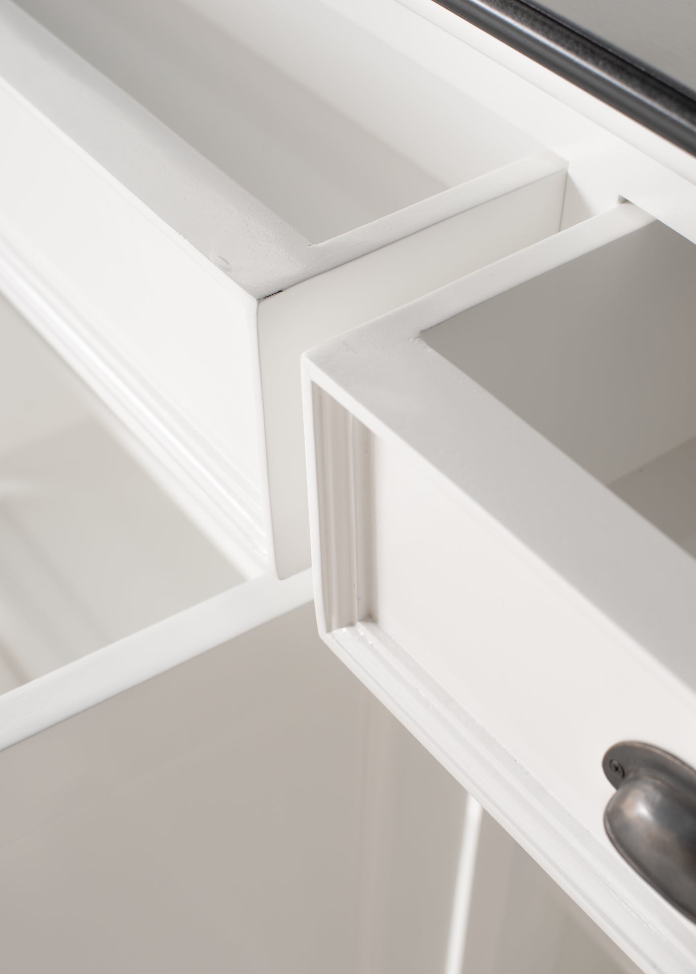 Close-up of the Halifax Contrast Buffet Console Table showing two open drawers, white painted drawer fronts and a dark timber top.