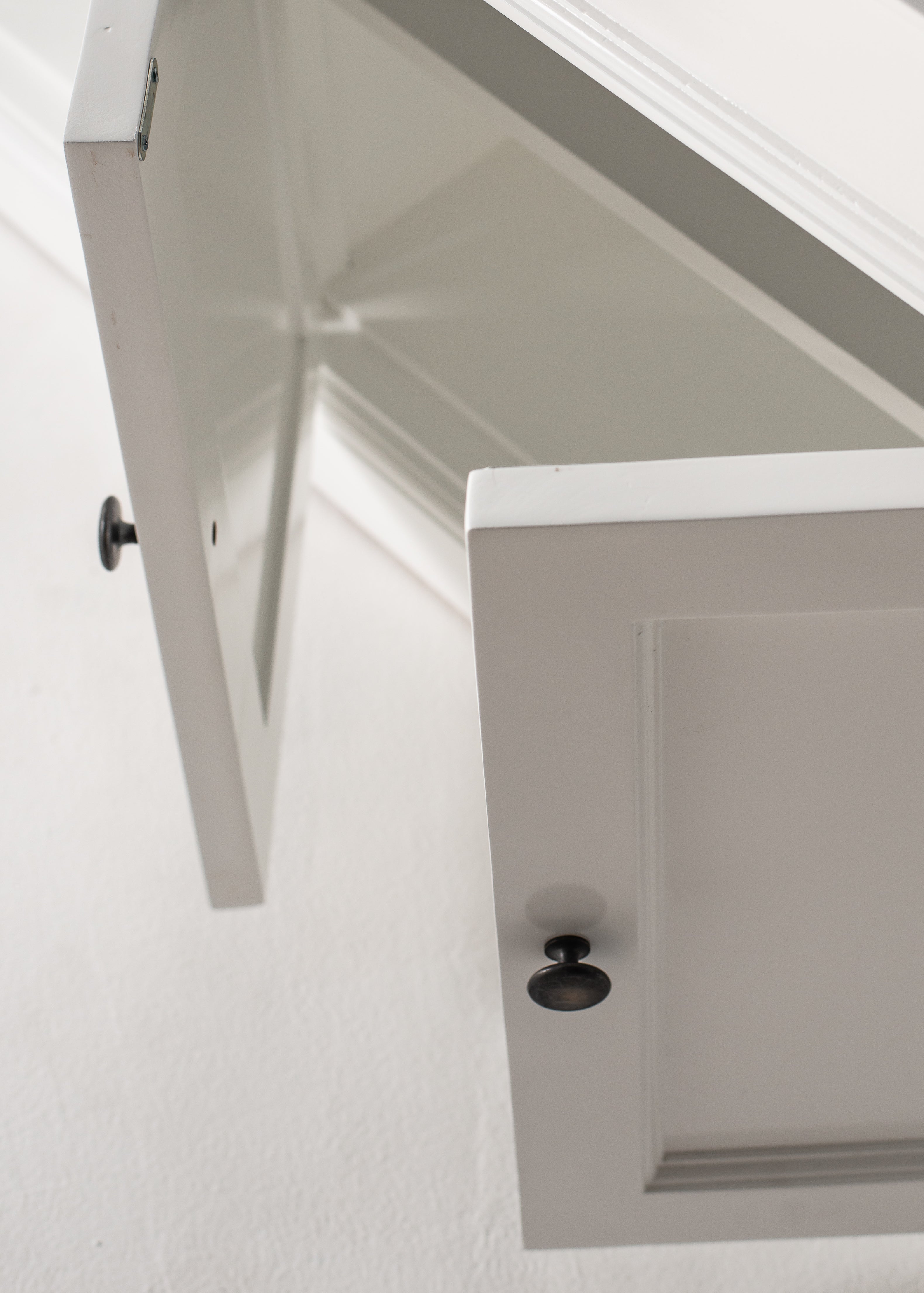 Close-up of the Halifax Contrast Buffet Console Table with cupboard doors and drawers open, highlighting the white painted storage interior.