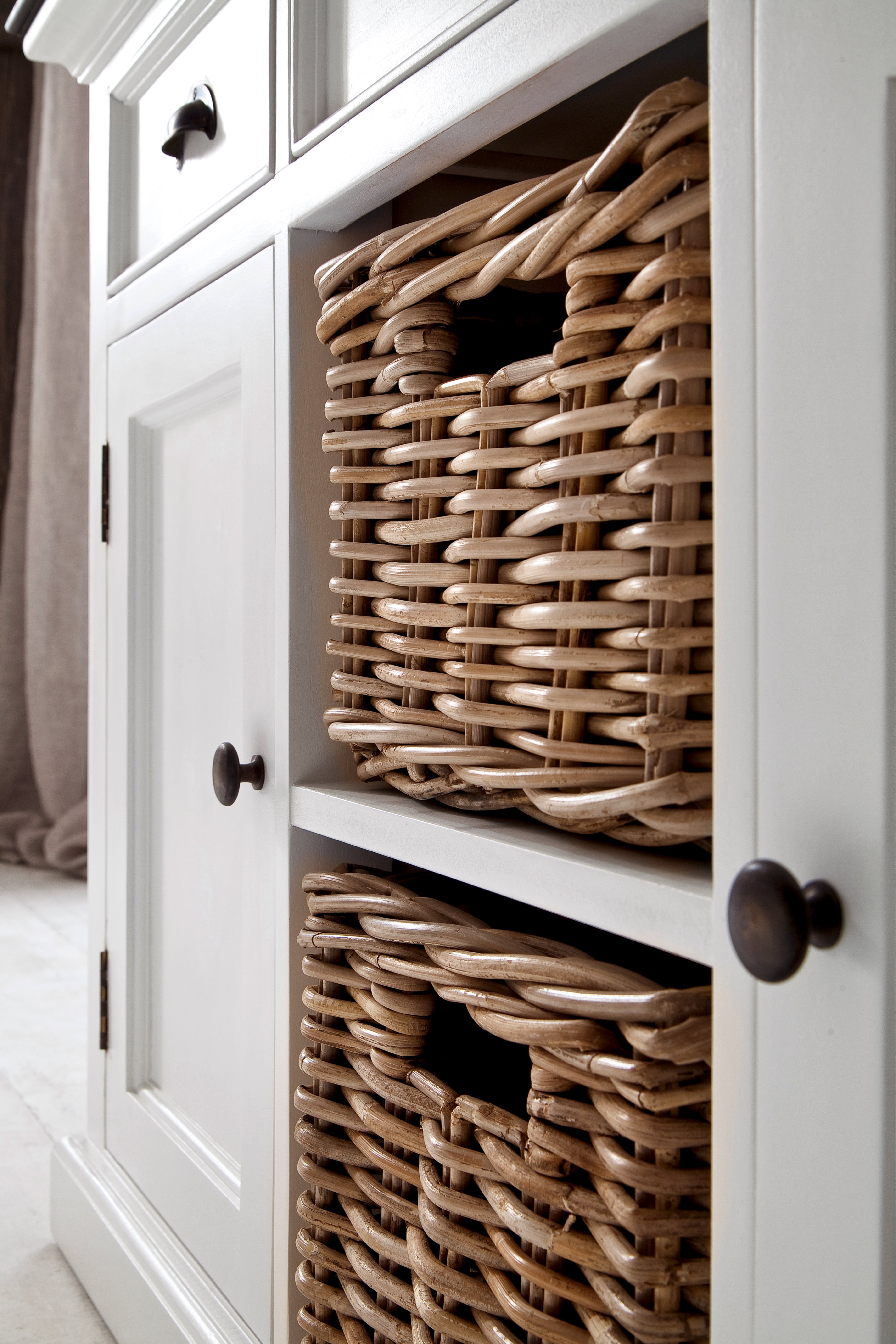 Close-up of the Halifax Contrast Buffet with 2 Baskets, showing the open centre shelving and woven basket storage.