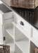 Close-up of rattan storage baskets with the Halifax Contrast Buffet drawer and white painted frame in the background.