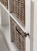 Close-up of rattan baskets fitted into the open shelving of the Halifax Contrast Buffet.