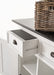 Detail view of an open drawer and rattan basket on the Halifax Contrast Buffet with black timber top.
