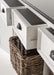 Close-up of multiple open drawers on the Halifax Contrast Buffet with rattan baskets in the shelves below.