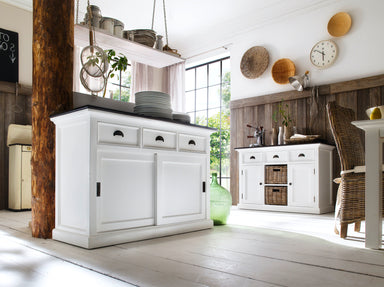 Lifestyle image of the Halifax Contrast Buffet with Sliding Doors in a bright dining room, styled with plates and another matching buffet in the background.