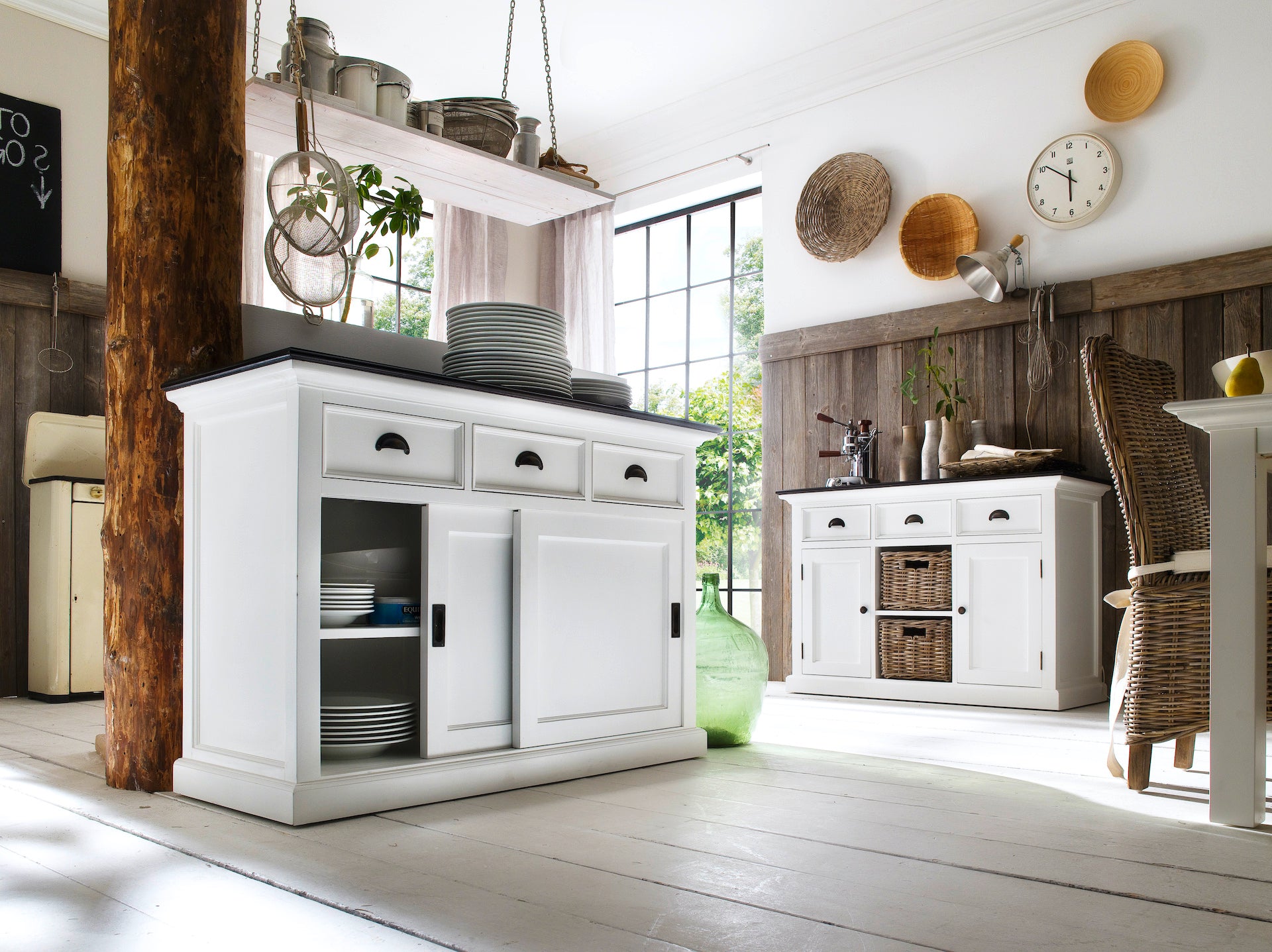 Lifestyle image of the Halifax Contrast Buffet with Sliding Doors styled in a bright dining space with white floors, timber wall panelling and woven accents.