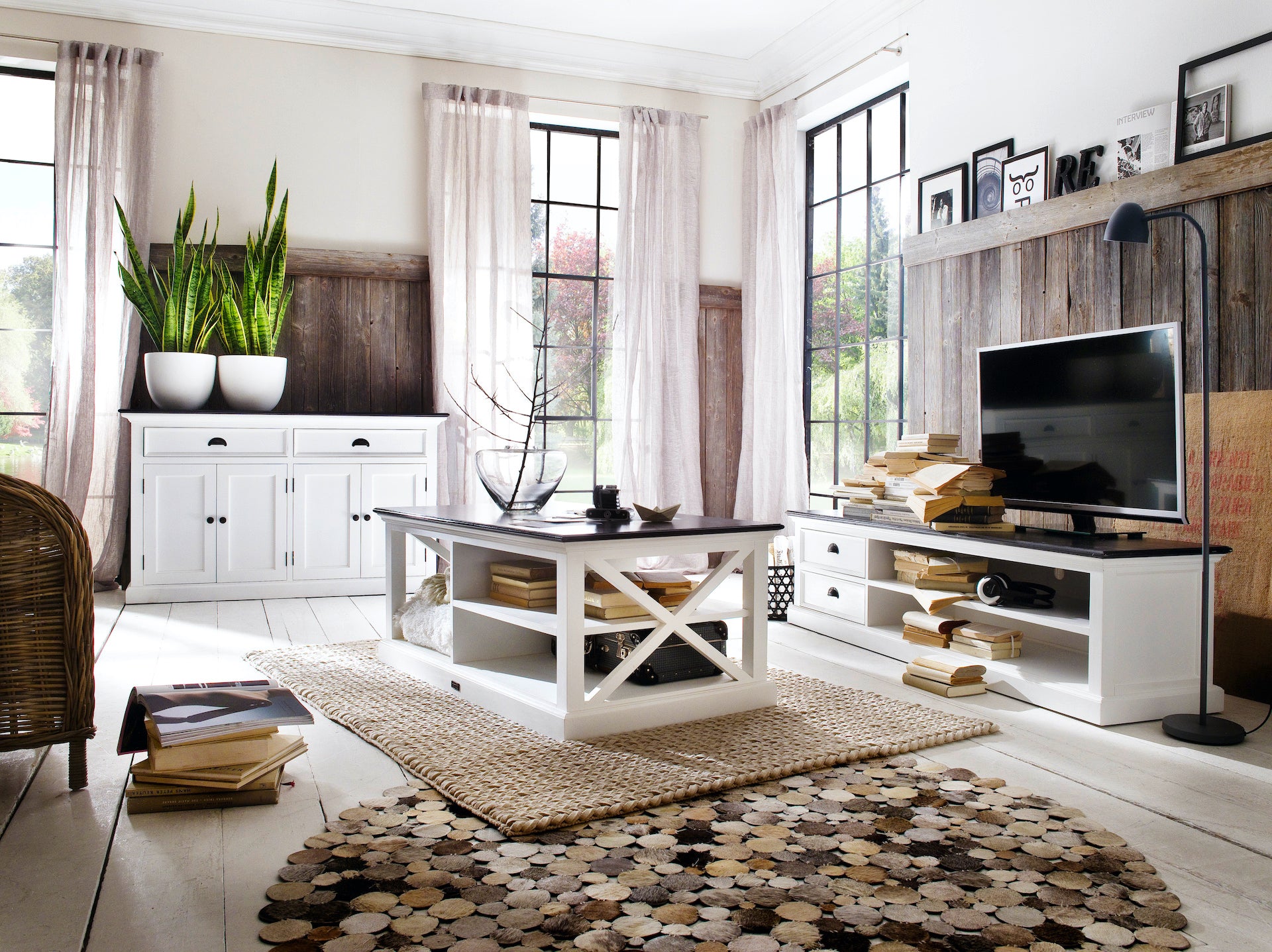 Styled living room featuring the Halifax Contrast Classic Buffet, coffee table and entertainment unit in white with black timber tops.