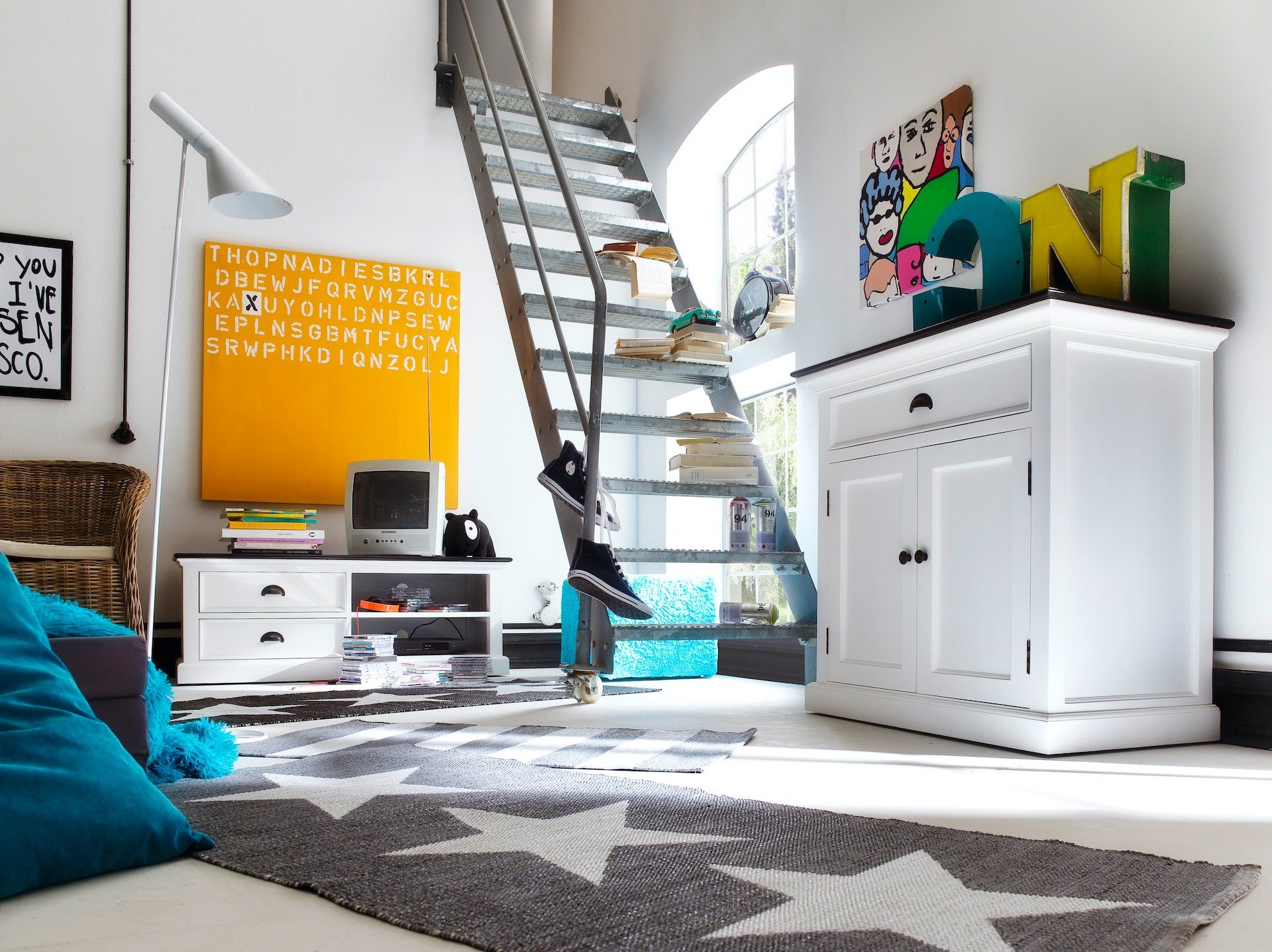 Lifestyle image of the Halifax Contrast Small Buffet in a light-filled living space with a white finish and black timber top.