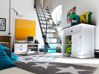 Halifax Contrast Small Buffet shown in a modern living room with the cupboard doors open, revealing internal shelf storage.