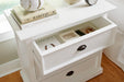 Close-up of the Halifax Grand Bedside Drawer Unit with the top drawer open, showing internal storage and styled bedside decor.