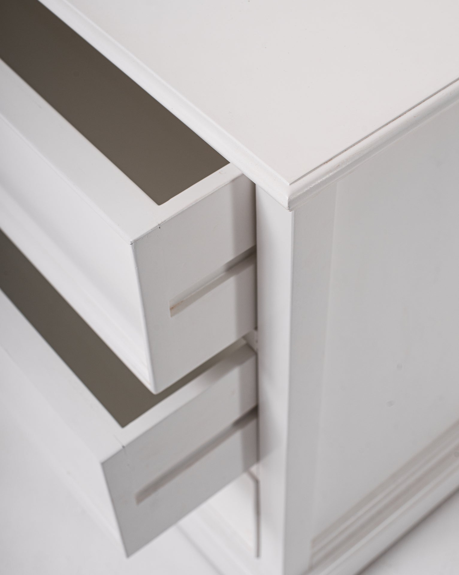 Close-up of the Halifax Grand Bedside Drawer Unit showing the open drawer, white painted finish and side panel detail.