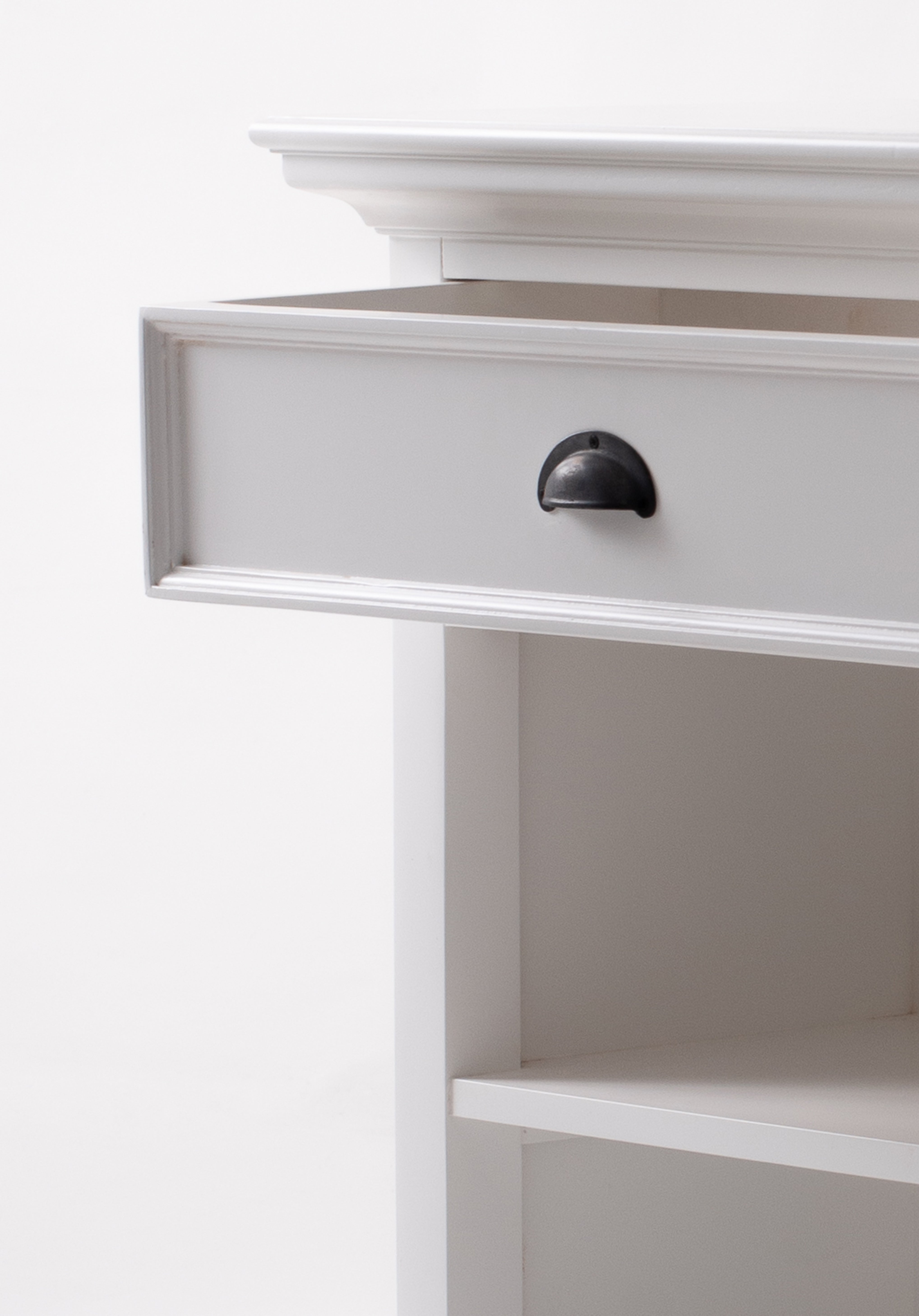 Close-up of the Halifax Grand Bedside Table showing the white drawer, black cup handle and open shelf below.